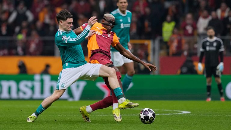 Liverpool's Florian Wirtz competes for the ball with Galatasaray's Victor Osimhen