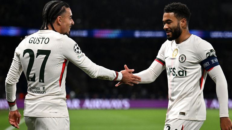 Gusto celebrates his goal with Chelsea captain Reece James