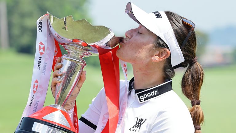 Hannah Green poses with the trophy after winning the HSBC Women's World Championship at Sentosa Golf Club 