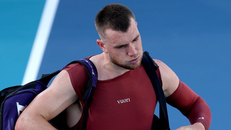 Jack Draper of Great Britain leaves the court after losing to Reilly Opelka of the United States on Day 4 of the Miami Open Presented by Ita