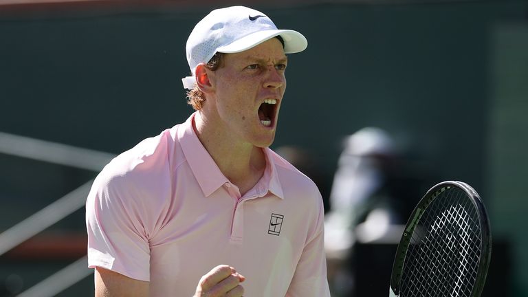 Jannik Sinner of Italy celebrates match point against Alexander Zverev of Germany during their Men's Singles Semifinals match on Day 11 of t