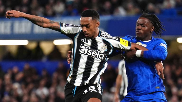 Newcastle United's Joe Willock (left) and Chelsea's Romeo Lavia in action at Stamford Bridge