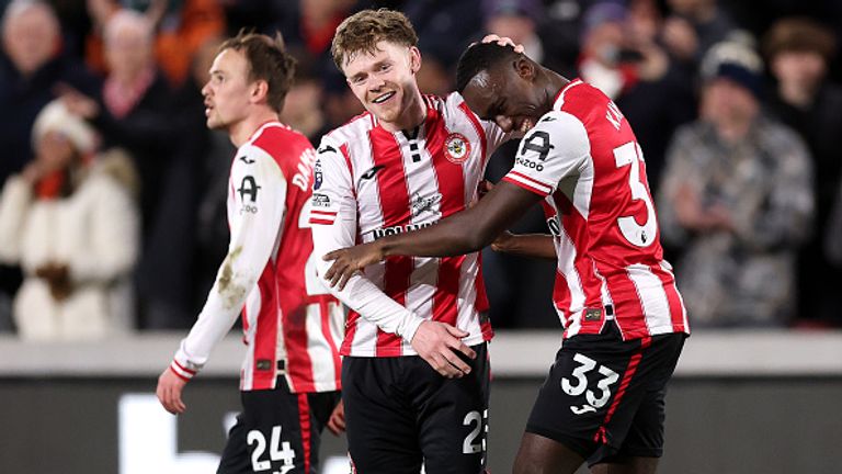 BRENTFORD, ENGLAND - MARCH 16: Michael Kayode of Brentford celebrates scoring his team's first goal with teammate Keane Lewis-Potter during the Premier League match between Brentford and Wolverhampton Wanderers at Gtech Community Stadium on March 16, 2026 in Brentford, England. (Photo by Julian Finney/Getty Images)