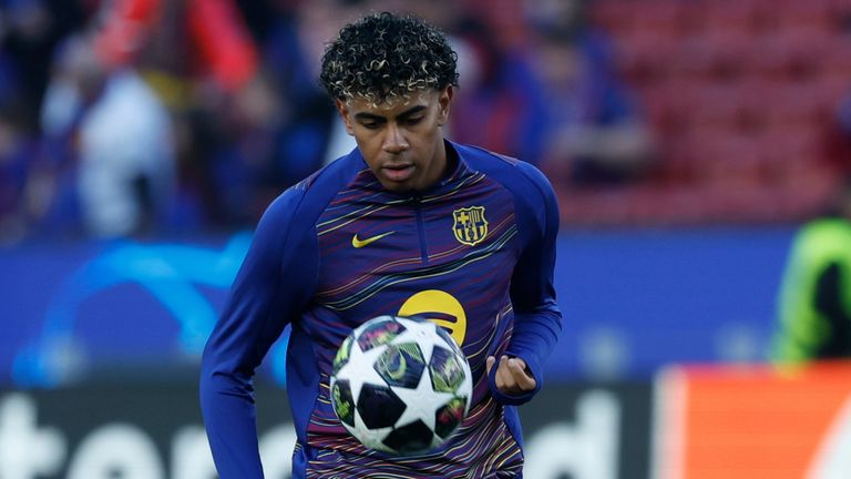 Barcelona's Lamine Yamal warms up before the Champions League match against Newcastle