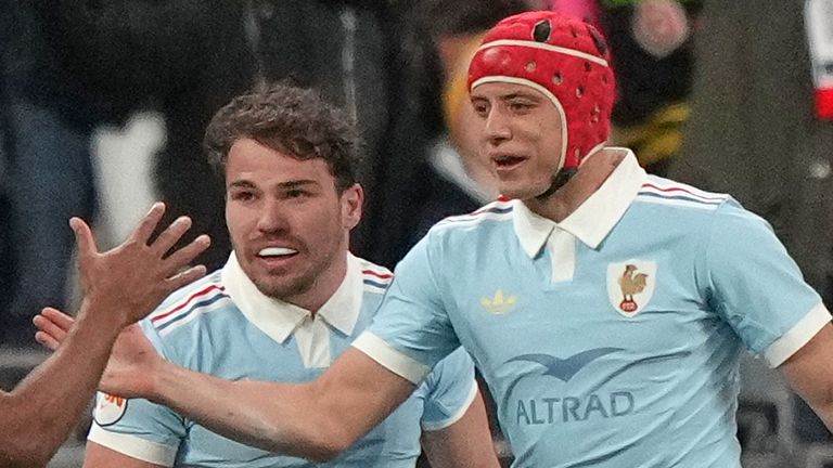 Louis Bielle...Biarrey of France, right, celebrates after scoring a try during the Six Nations rugby union match between France and England in Saint-Denis, outside Paris, Saturday, March 14, 2026. (AP Photo/Michel Euler)