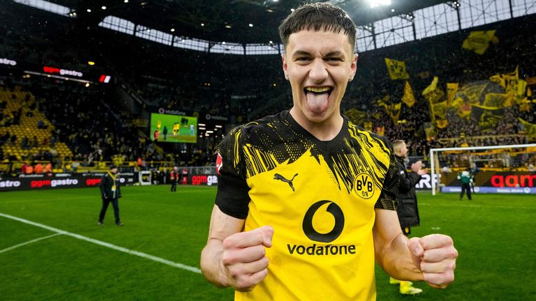 Luca Reggiani of Borussia Dortmund reacts following the win over Augsburg in which he scored