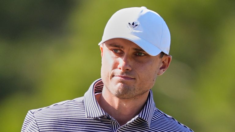 Ludvig Aberg of Sweden acknowledges applause from the gallery after a putt on the 11th green during the second round of The Player