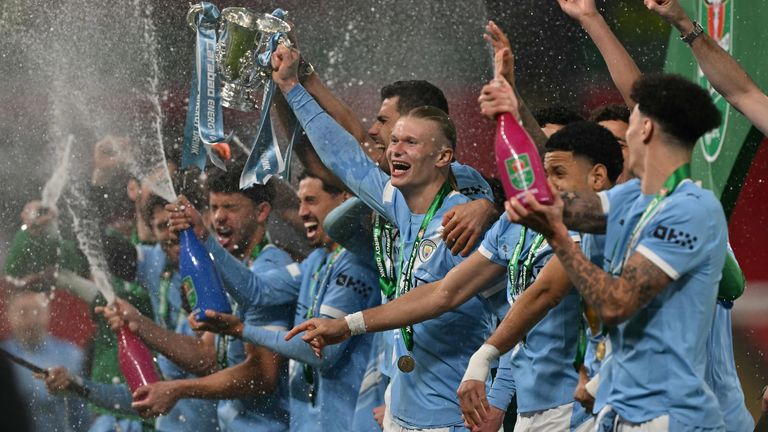 Manchester City players celebrate their victory in the Carabao Cup final
