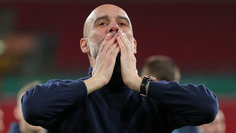 Pep Guardiola celebrates Manchester City's victory in the Carabao Cup final