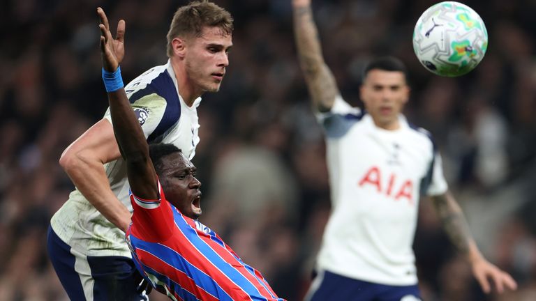 Micky van de Ven fouls Ismaila Sarr and is sent off for Tottenham against Crystal Palace