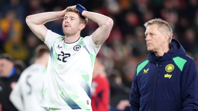 Republic of Ireland's Nathan Collins (left) and head coach Heimir Hallgrimsson appear dejected following defeat in a penalty shootout
