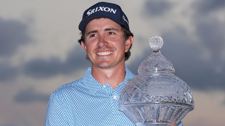 Nico Echavarria of Colombia holds the Cognizant Classic Trophy