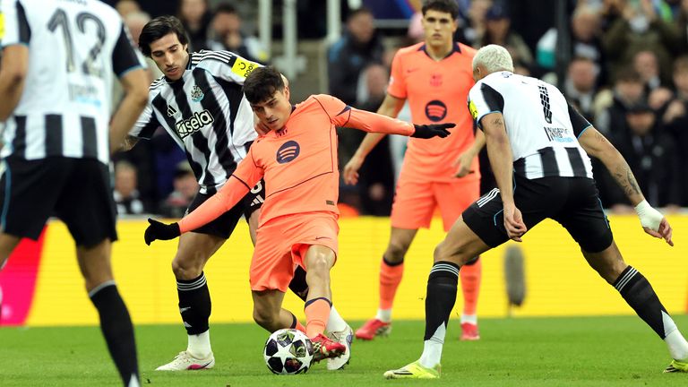 Barcelona's Pedri takes on Newcastle's Sandro Tonali 