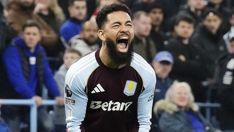 Douglas Luiz celebrates after giving Aston Villa an early lead against Chelsea