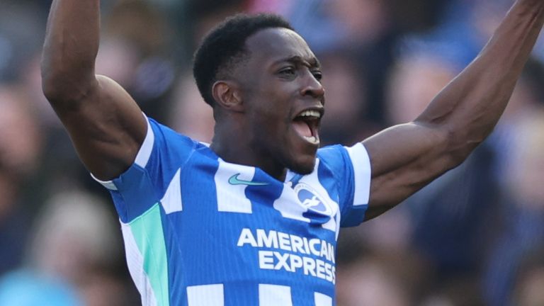 Danny Welbeck celebrates giving Brighton a 2-1 lead against Liverpool