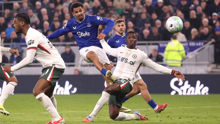 Iliman Ndiaye curls home Everton's third goal against Chelsea