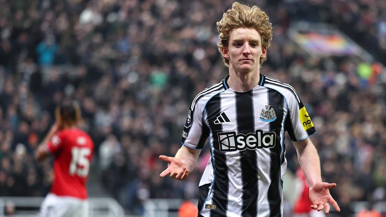 Anthony Gordon celebrates after opening the scoring for Newcastle from the penalty spot