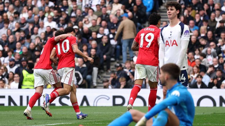 Spurs players look dejected as Morgan Gibbs-White celebrates giving Nottingham Forest a 2-0 lead