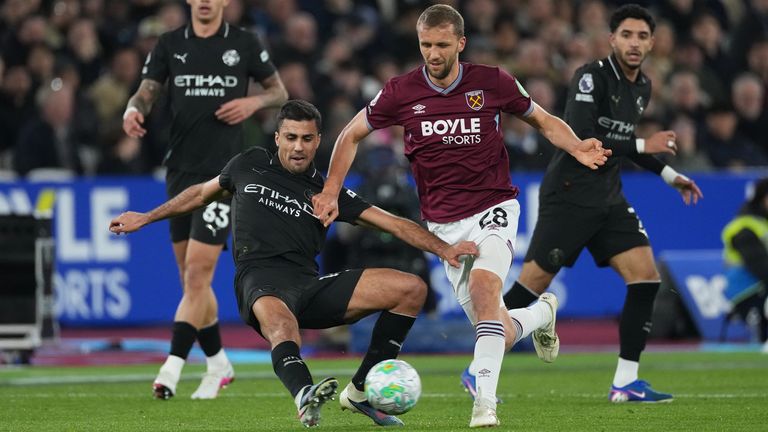 Rodri attempts to tackle West Ham's Tomas Soucek (AP Photo/Dave Shopland)