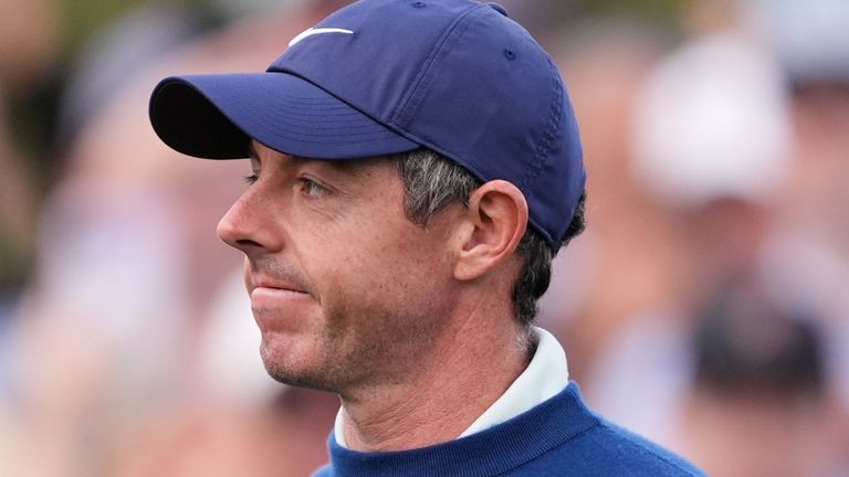 Rory McIlroy of Northern Ireland acknowledges fans appluase before hitting off the 10th tee during the second round of The Players