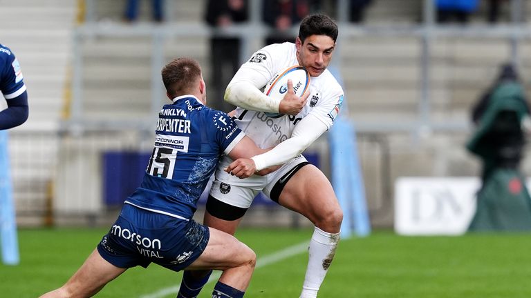 Bath Rugby's Santi Carreras is tackled by Sale Sharks' Joe Carpenter