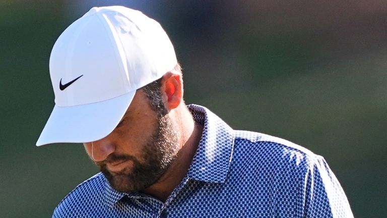 Scottie Scheffler looks down at his ball after playing through the 12th hole during the second round of The Players