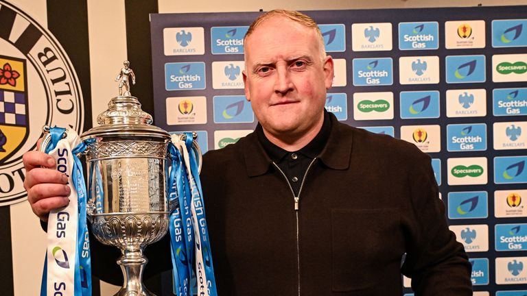 Former Hibernian player Conrad Logan with the Scottish Cup trophy before the semi-final draw.