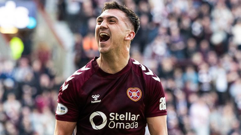 Oisin McEntee celebrates after giving Hearts the lead against Dundee
