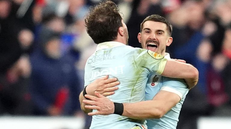 France's Thomas Ramos celebrates with Antoine Dupont after his last-gasp penalty kick wins the match