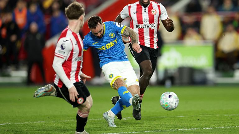 BRENTFORD, ENGLAND - MARCH 16: Adam Armstrong of Wolverhampton Wanderers scores his team's first goal during the Premier League match between Brentford and Wolverhampton Wanderers at Gtech Community Stadium on March 16, 2026 in Brentford, England. (P