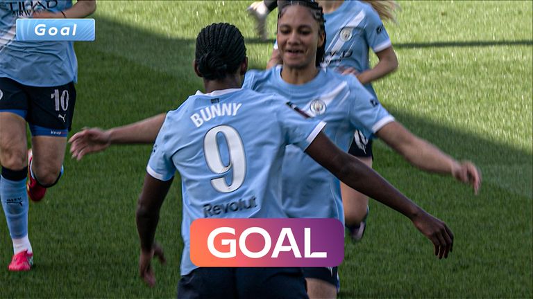 Khadija Shaw opens the scoring for Manchester City after Tottenham fail to clear their line.