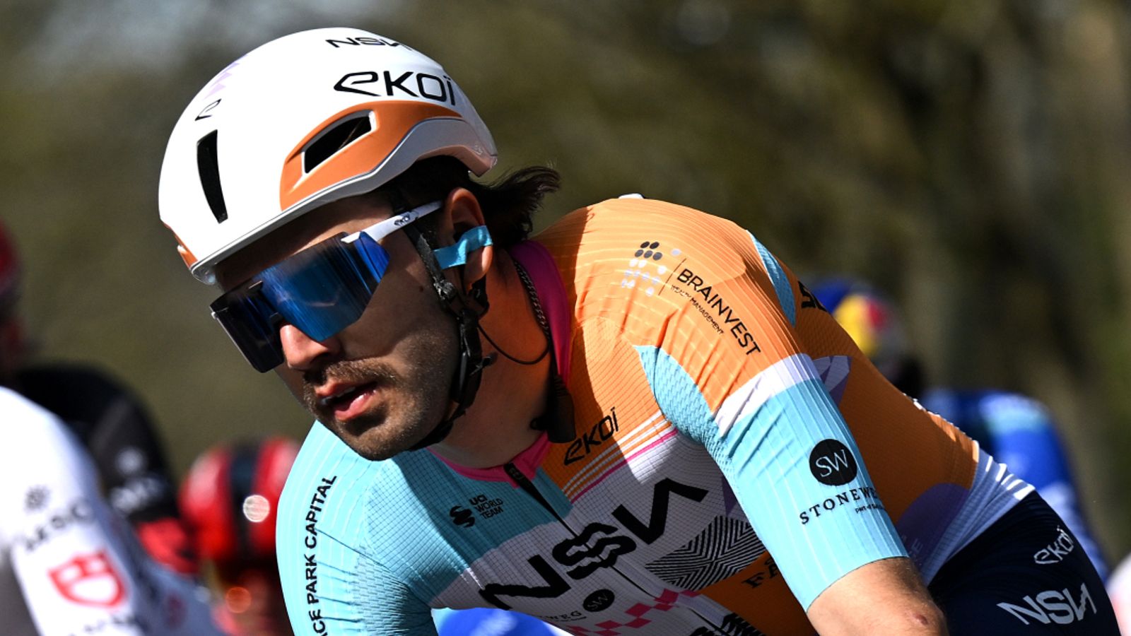 Cyclist Kiaan Watts banned for punching fellow rider in head during race