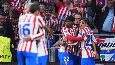 Atletico Madrid's Ademola Lookman celebrates with team-mates after scoring his side's opening goal