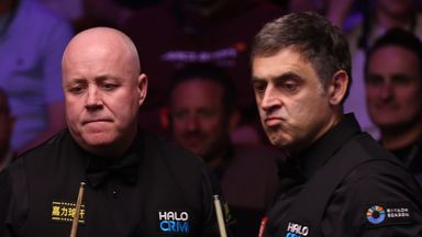 John Higgins fought back in his second-round clash with Ronnie O'Sullivan, cutting his lead to two frames at 9-7