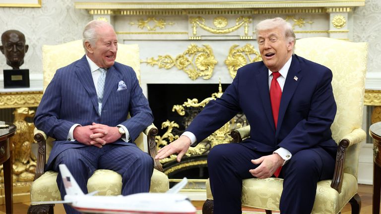 Donald Trump and King Charles react as they meet in the Oval Office .
Pic: Reuters