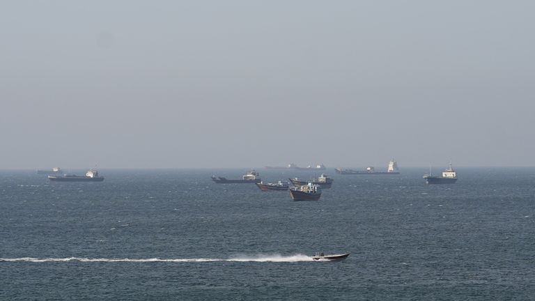 Ships and tankers in the Strait of Hormuz off the coast of Musandam, Oman, on Saturday. Pic: Reuters


