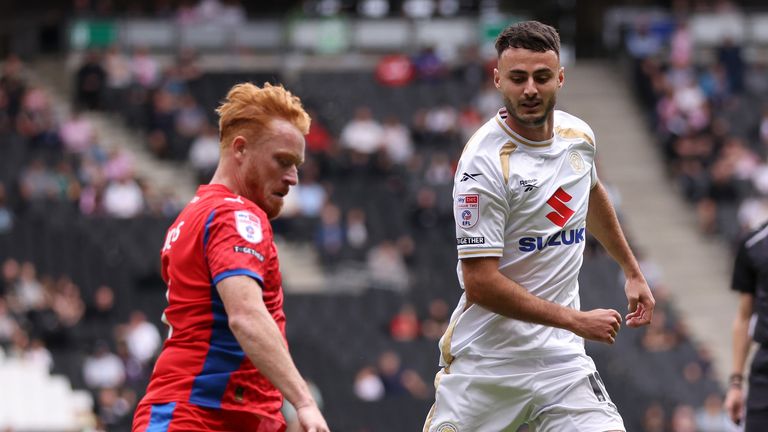 Collins broke his shoulder on his MK Dons debut