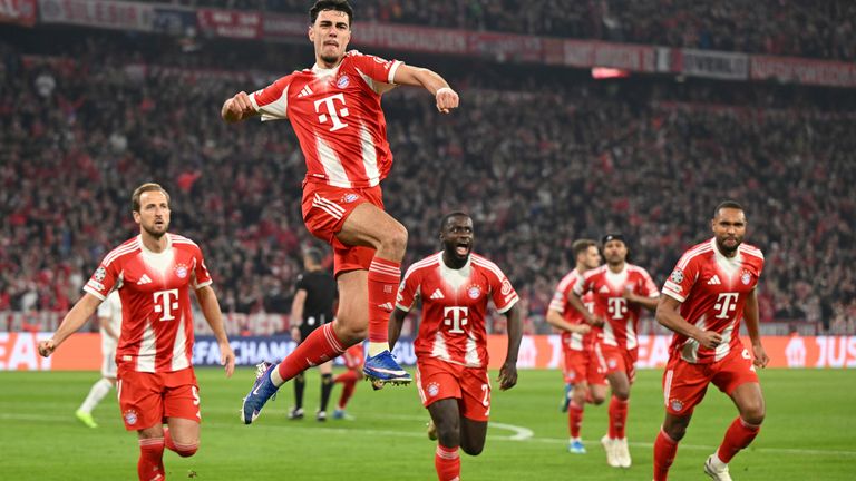 Bayern Munich's Aleksandar Pavlovic celebrates after scoring his side's equaliser against Real Madrid in the Champions League