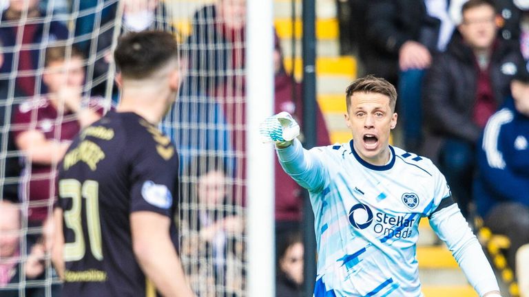 LIVINGSTON, SCOTLAND - APRIL 05: Hearts' Alexander Schwolow berates his defence after conceding a goal to make it 1-0 during a William Hill Premiership match between Livingston and Heart of Midlothian at the Home of the Set Fare Arena, on April 05, in Livingston, Scotland. (Photo by Mark Scates / SNS Group)