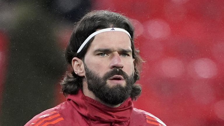 Liverpool goalkeeper Alisson Becker warms up before the Premier League match at Anfield, Liverpool. Picture date: Saturday January 31, 2026.