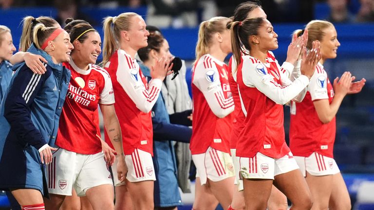 Arsenal players applaud the fans after advancing in the UEFA Women's Champions League semi-finals by beating Chelsea
