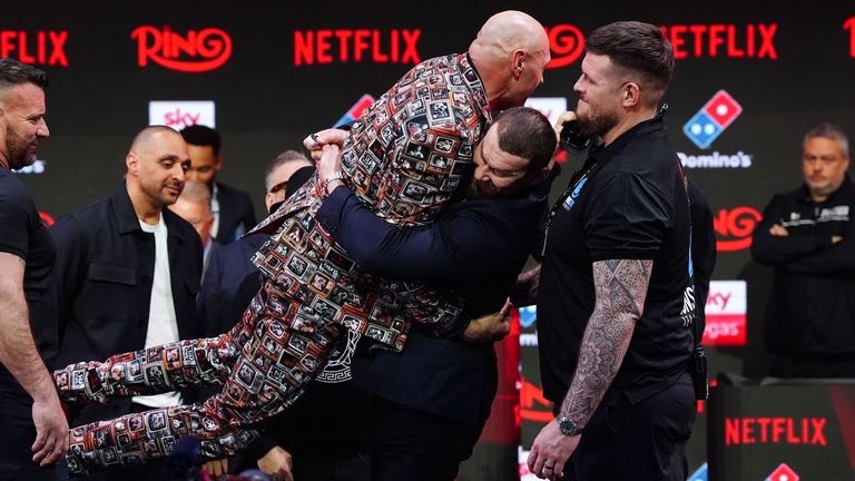 Arslanbek Makmudov lifts Fury off his feet