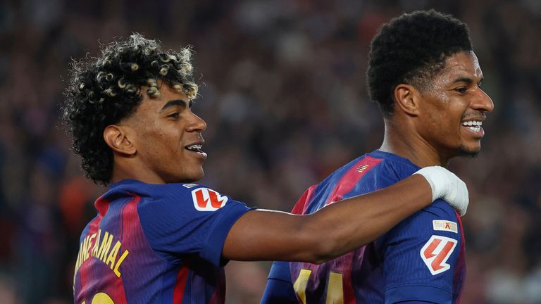 Barcelona's Marcus Rashford, right, celebrates after scoring his side's fourth goal with Lamine Yamal 