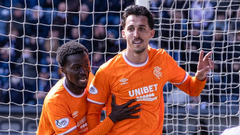 Rangers' Bojan Miovski celebrates with Mohamed Diomande (L) after scoring to make it 6-3