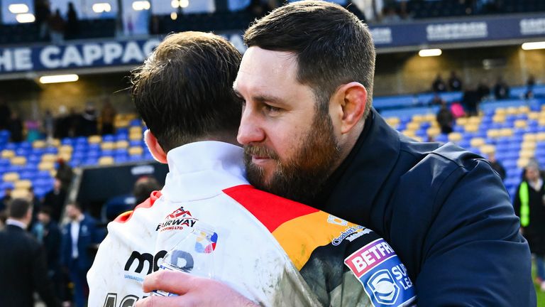 Picture by Olly Hassell/SWpix.com - 08/02/2026 - Rugby League - Betfred Challenge Cup Round 3 - London Broncos v Bradford Bulls - Cherry Red Records Stadium, Kingston, England - Bradford Bulls Head Coach Kurt Haggerty and Andy Ackers of Bradford celebrates their teams victory over London