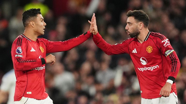 Casemiro and Bruno Fernandes celebrate after Man Utd pull a goal back against Leeds