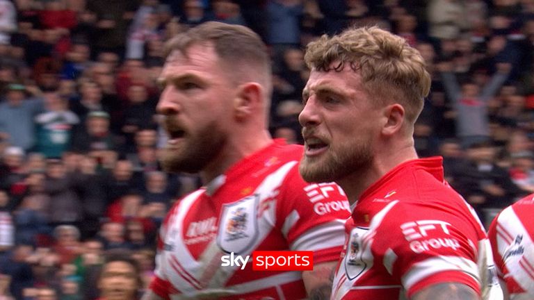 Daryl Clark powers over to cut Wigan lead