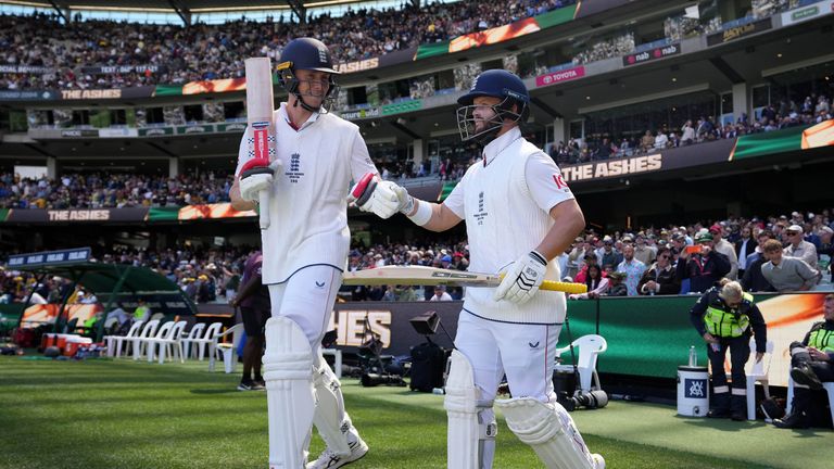 England's Ben Duckett (right) and Zak Crawley walk out to bat on day one of the fourth NRMA Insurance Ashes Series 2025 test at the MCG