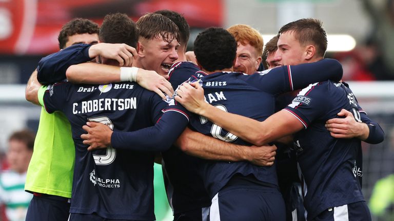DUNDEE, SCOTLAND - OCTOBER 19: Dundee players celebrate a famous win at Full Time during a William Hill Premiership match between Dundee and Celtic at The Scot Foam Stadium at Dens Park, on October 19, 2025, in Dundee, Scotland. (Photo by Craig Williamson / SNS Group)