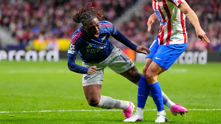 Atletico Madrid's David Hancko challenges Arsenal's Eberechi Eze for which a penalty was awarded and then rescinded after a VAR review